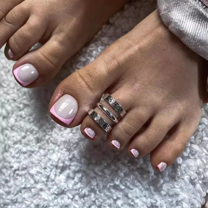 Fußnagelkunstset mit elegantem French Design und Glitzerakzenten Brehn