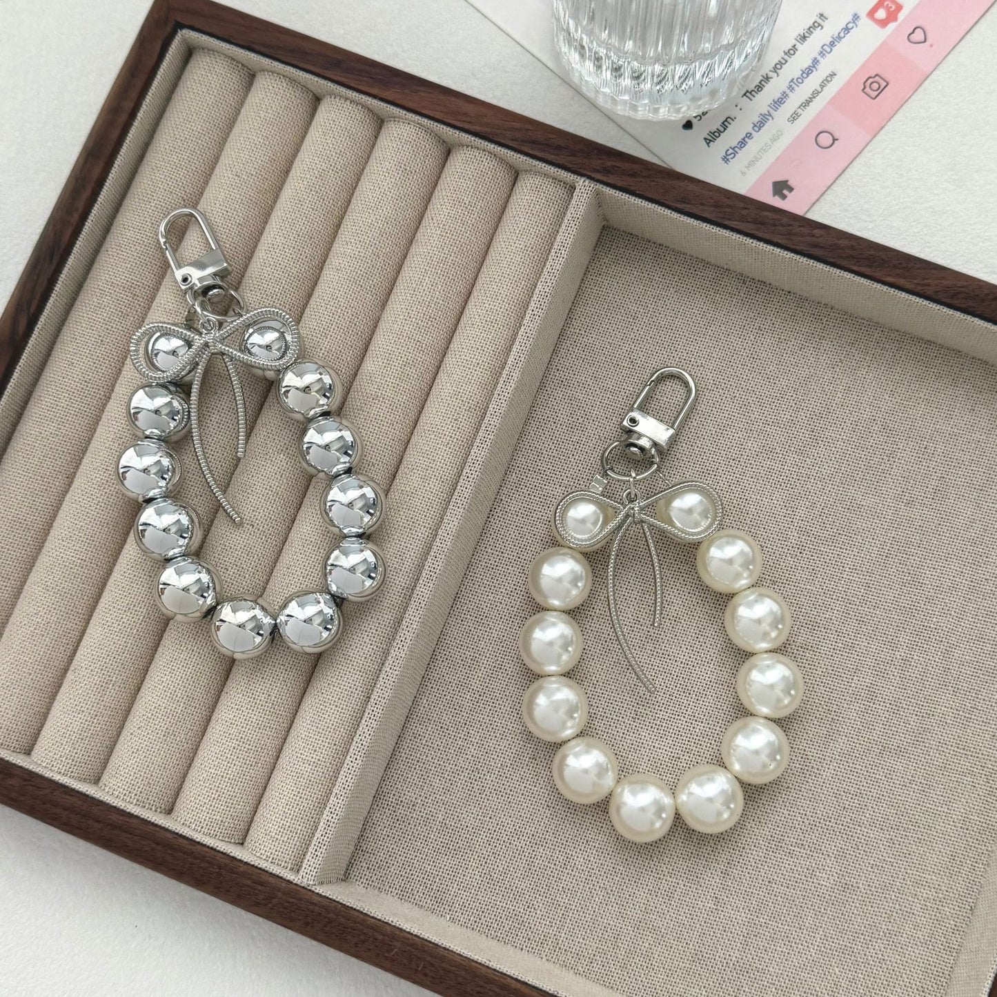 Eleganter Perlencharms-Schlüsselanhänger Brehn