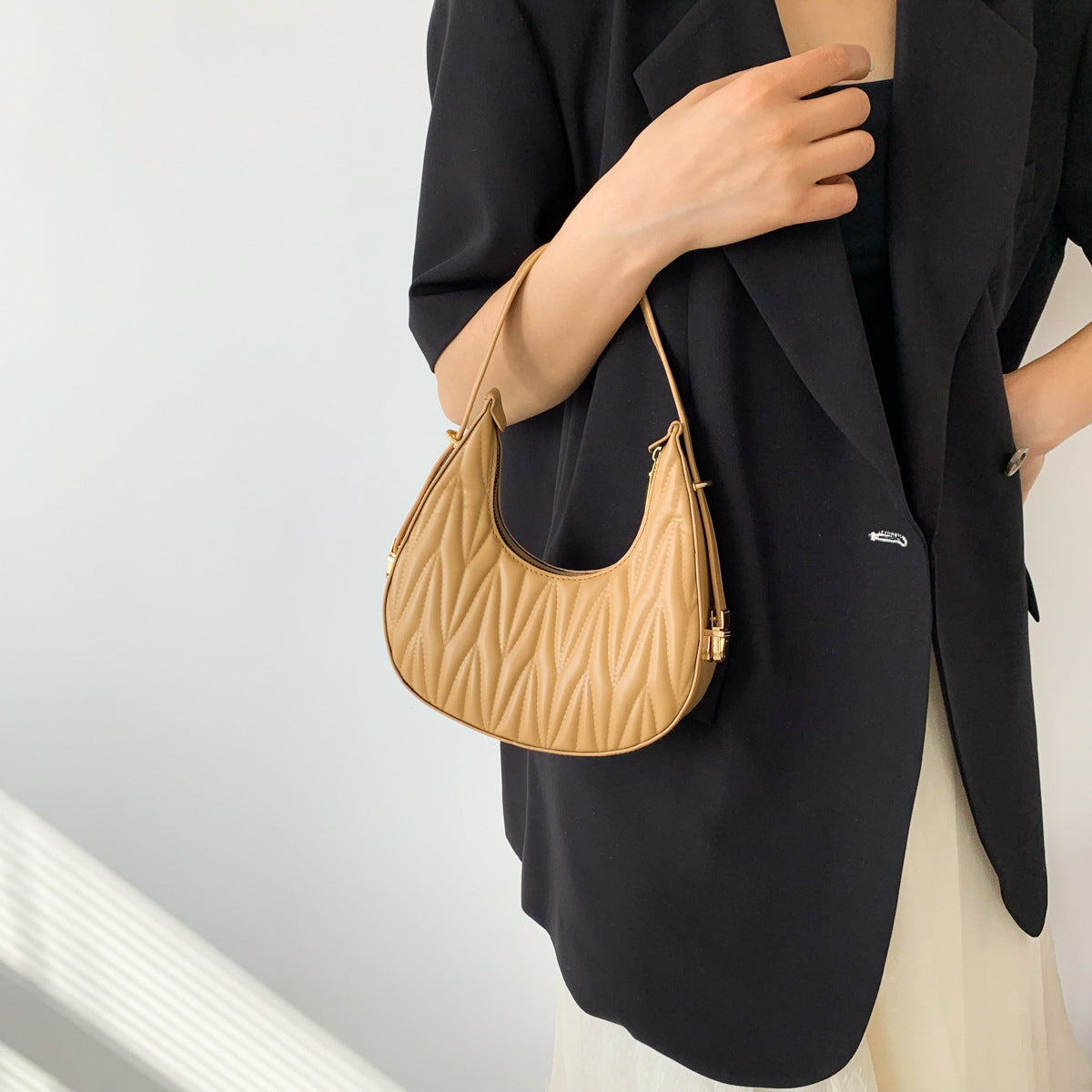 Gepolsterte Mini-Handtasche