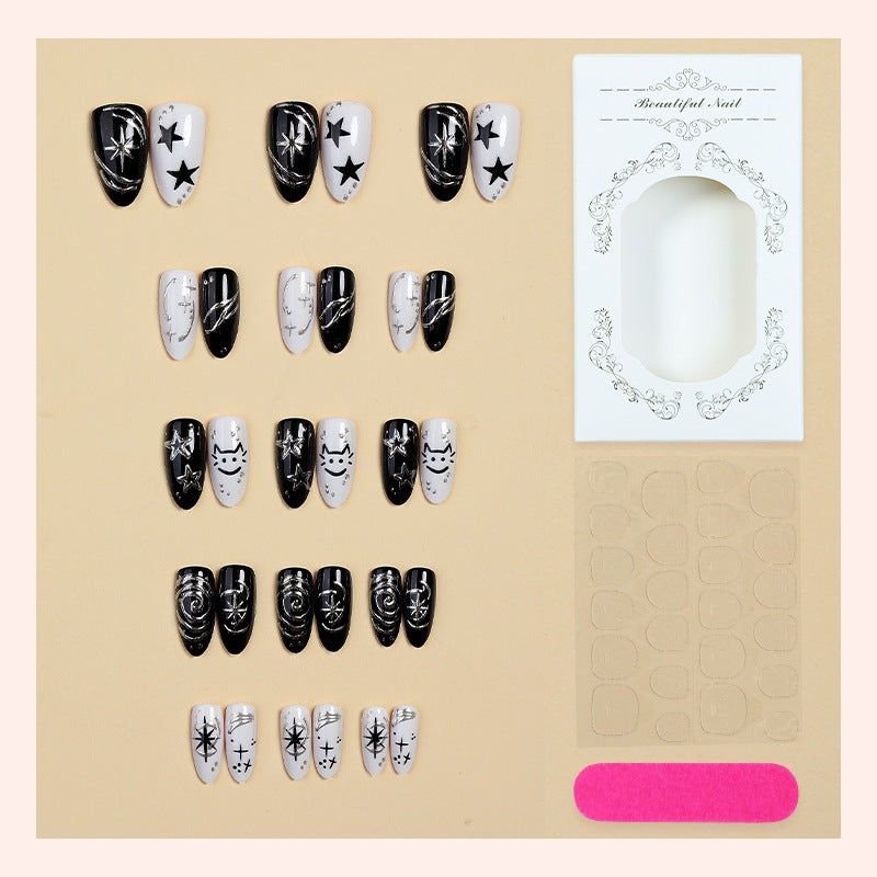 Kunstnagelset mit kreativen star-motiven und glitzernden Akzenten Brehn
