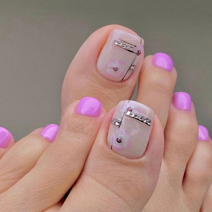 Kunstvolle Fußnagelkunst mit Glitzerakzenten Brehn