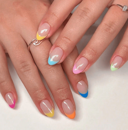 Kunstnagelset mit buntem French Design Brehn