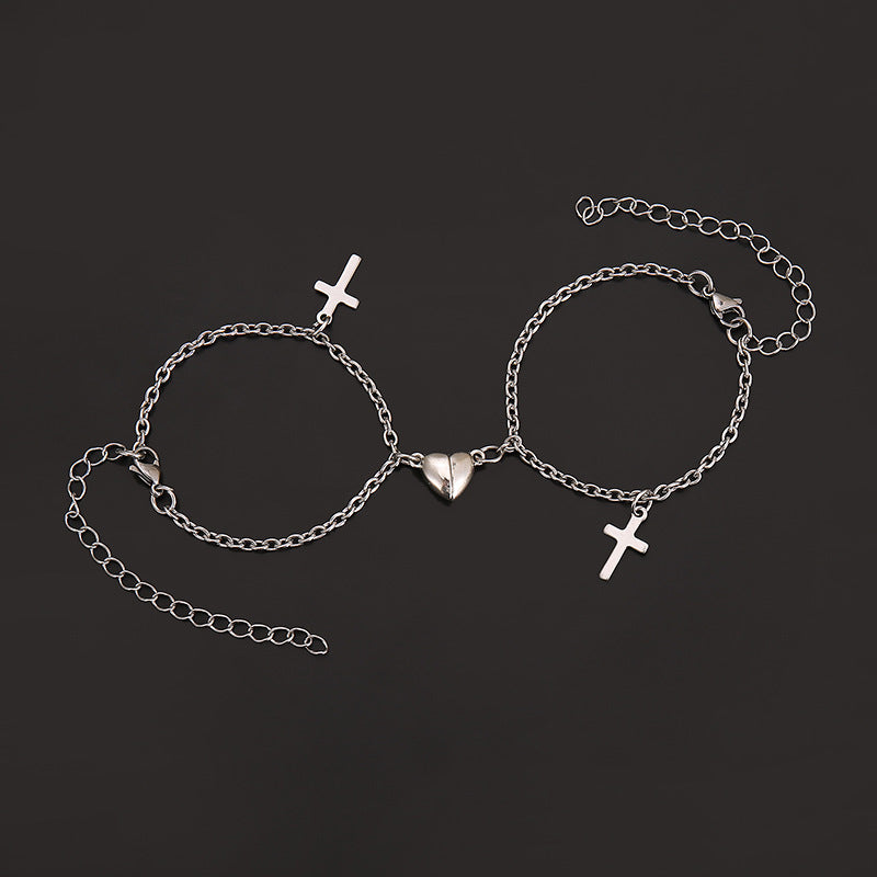 Versatile Armreif mit Kreuz- und Herzanhängern Brehn