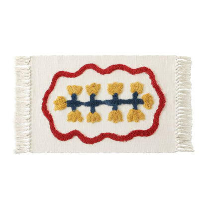 Handgewebter Baumwoll-Badmattenteppich mit Tufting-Blumenapplikation und Quasten Brehn