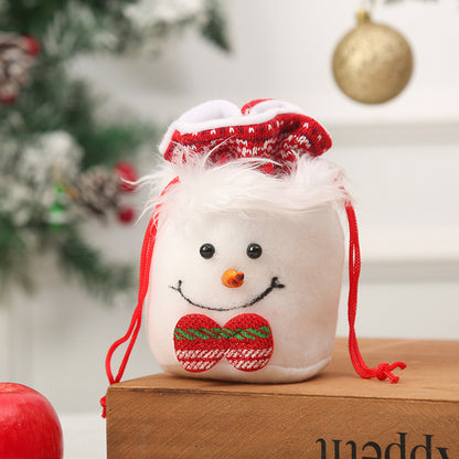 Niedlicher Weihnachtsgnom mit Geschenkesack Brehn
