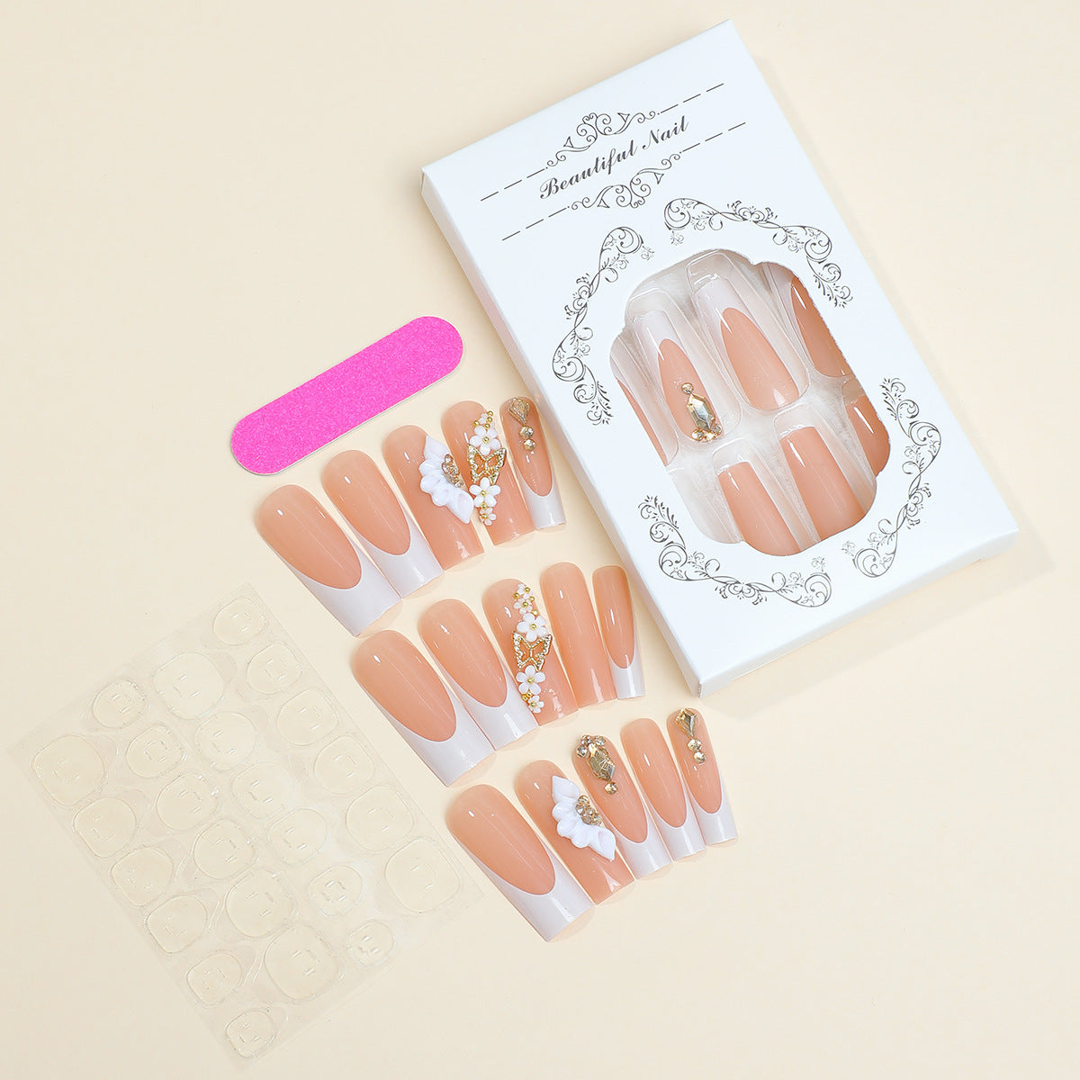 Kunstnagelset mit stilvollen Blüten- und Glitzerakzenten Brehn