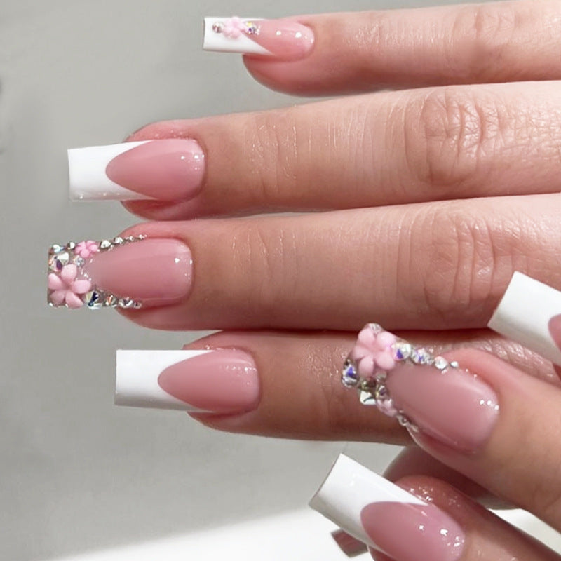 Nagelset mit eleganten Blüten- und Glitzerverzierungen Brehn