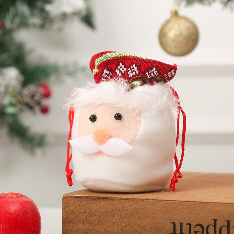 Niedlicher Weihnachtsgnom mit Geschenkesack Brehn