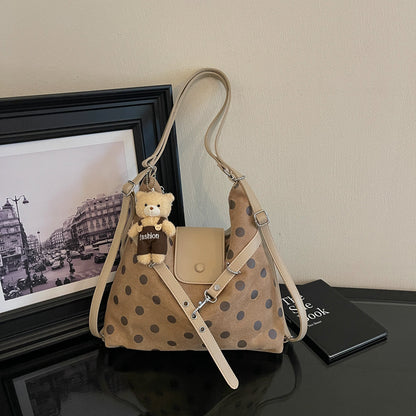 Modische gepunktete Schultertasche