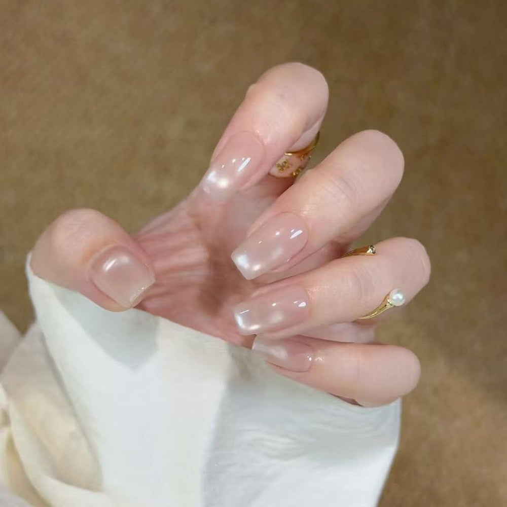 Glamouröse Kunstnagelspitzen mit 3D-Blüten- und Kristallverzierungen Brehn