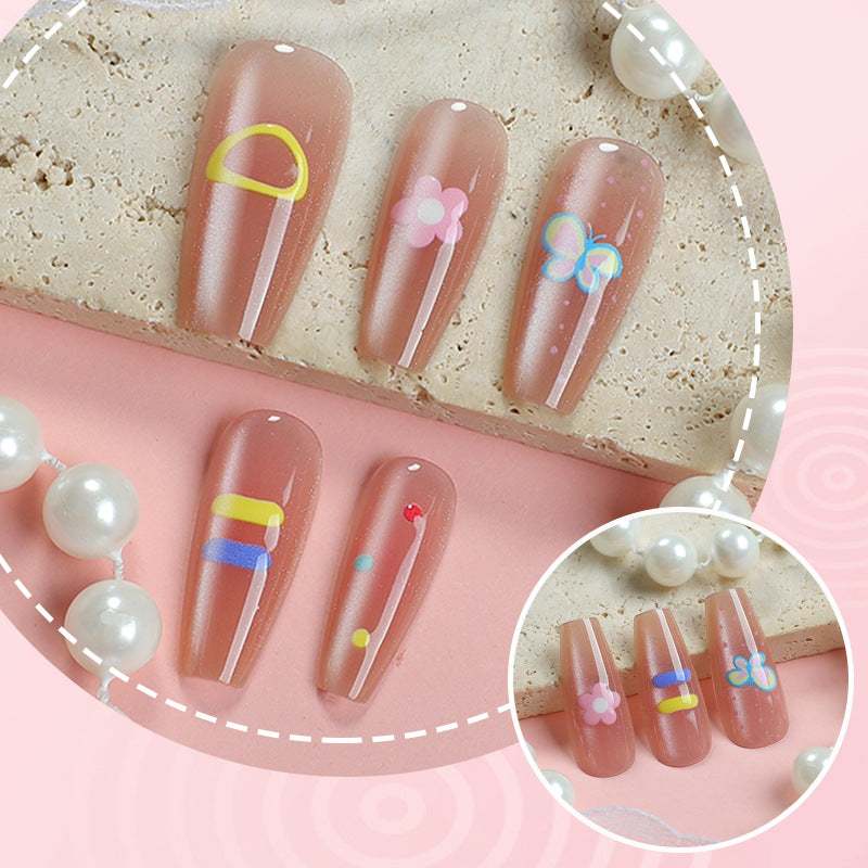 Dekoratives Press-On Nagelkunstset mit floralen und gemusterten Designs