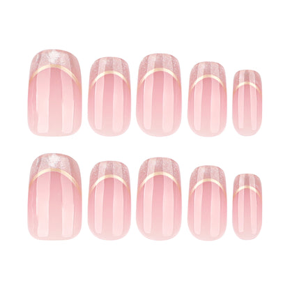Kunstvolle Nagelverlängerungen mit Glitzer- und Golddetails Brehn