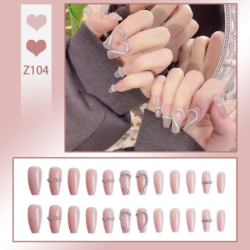 Kunstnagelset mit eleganten Glitzerverzierungen und schimmernden Akzenten Brehn
