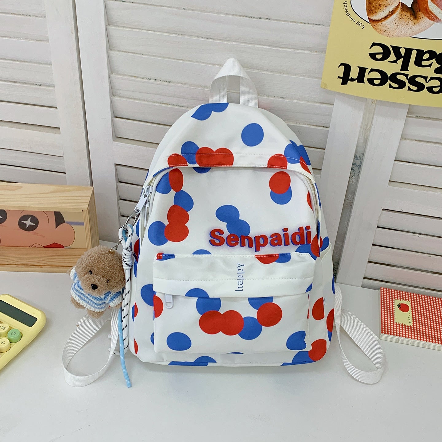 Verspielt gepunkteter Mini-Rucksack