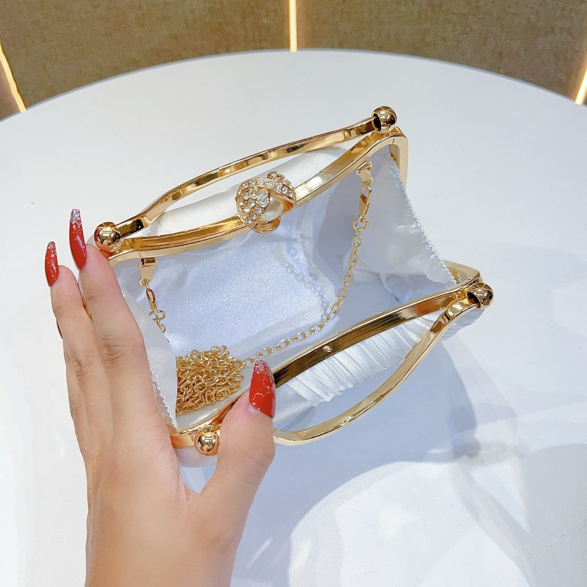 Satin Faltabendhandtasche