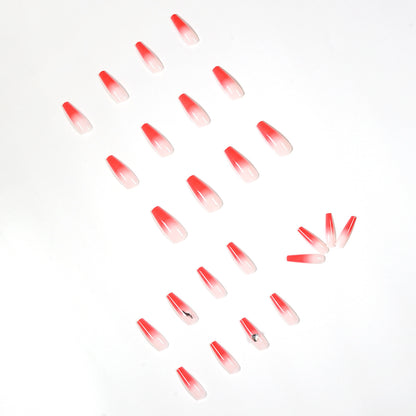 Kunstvolle Stiletto-Nägel mit elegantem Farbverlauf und Strassverzierung Brehn