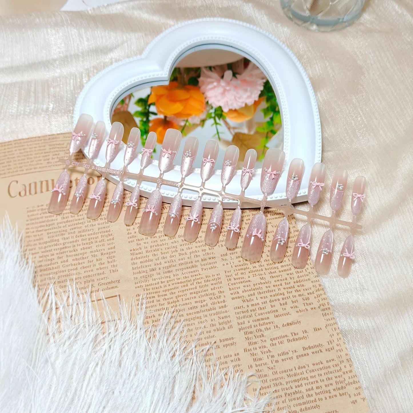 Kunstnägel mit elegantem Glitzer- und Schleifen-Design Brehn