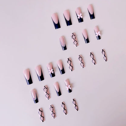 Kunstnagelset mit glamourösen Strass- und Schleifenakzenten Brehn