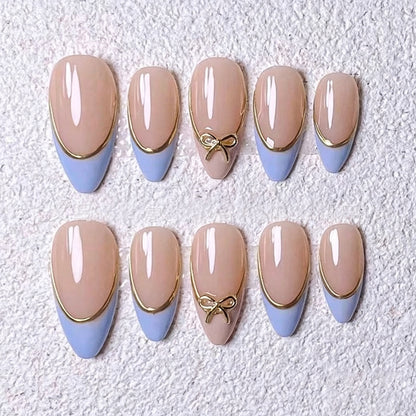 Kunstnagelset mit eleganten Designs und Goldakzenten Brehn