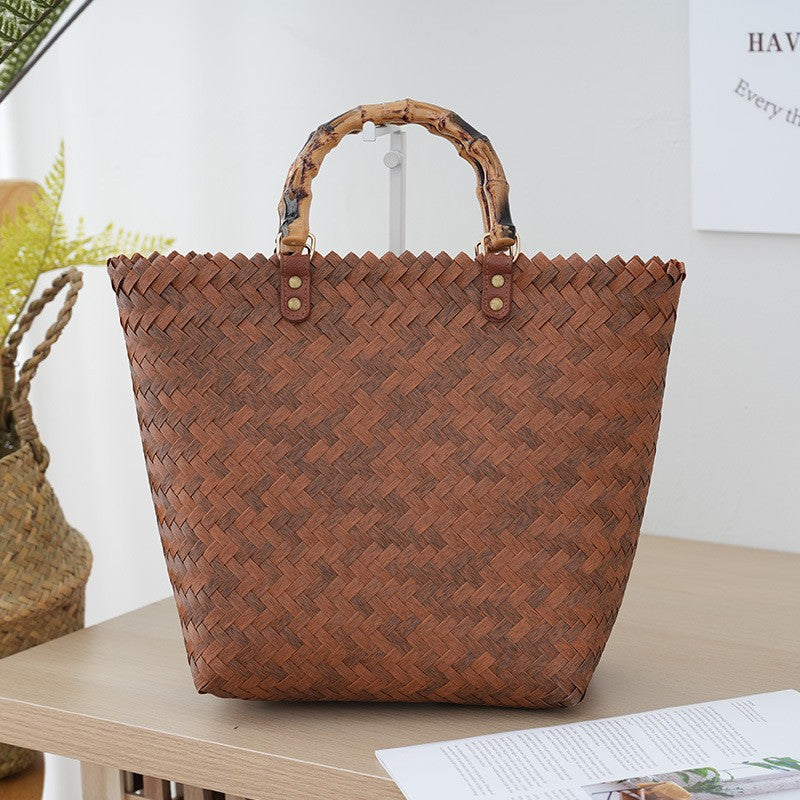 Handtasche Aus Geflochtenem Material mit Bambusgriffen Brehn