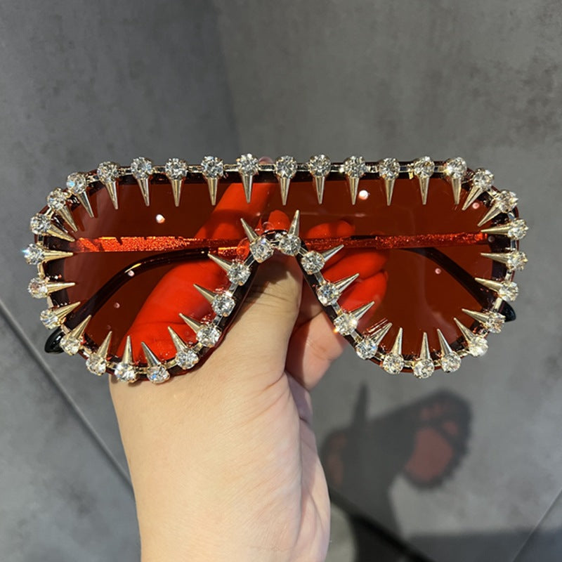 Damen extravagant gestaltete Cat-Eye-Sonnenbrille mit Glitzerakzenten Brehn