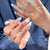 Dekoratives Press-On-Nagelset mit Schleifen- und Schmetterlingsdesigns Brehn