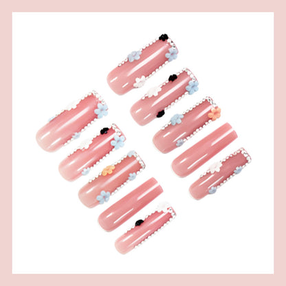 Künstliche Nagelkunstset mit floralen Verzierungen und Glitzerakzenten Brehn