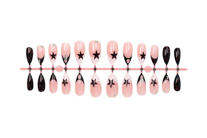 Kunstnagelset mit kreativen Sternenmotiven und Glitzerakzenten Brehn