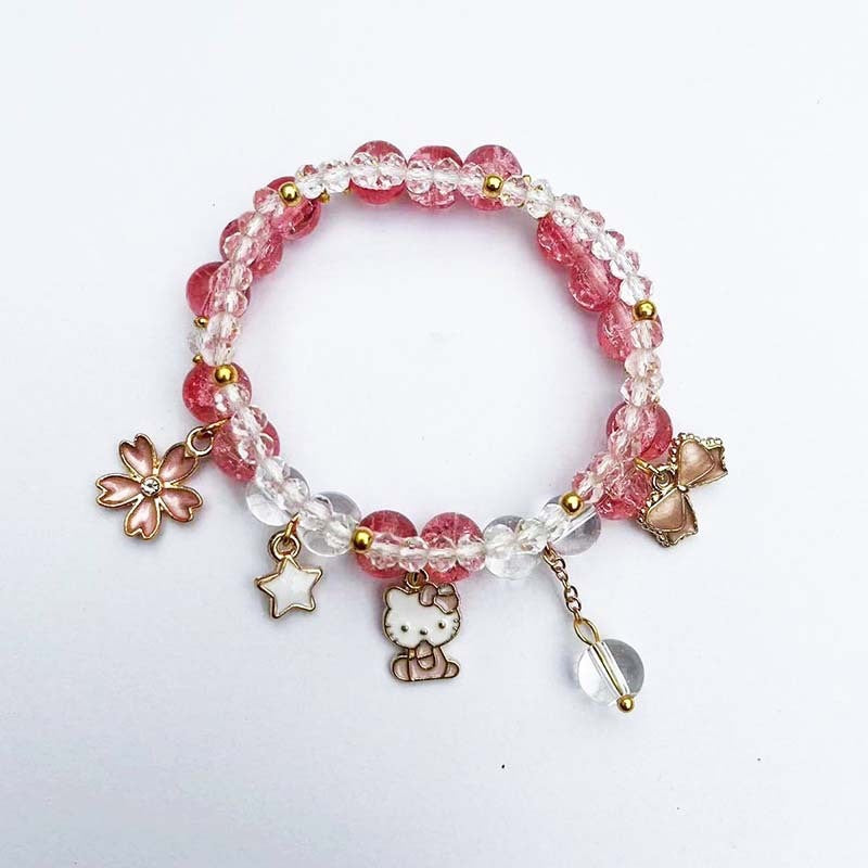 Elegantes Armband mit Tier- und Glitzeranhängern Brehn