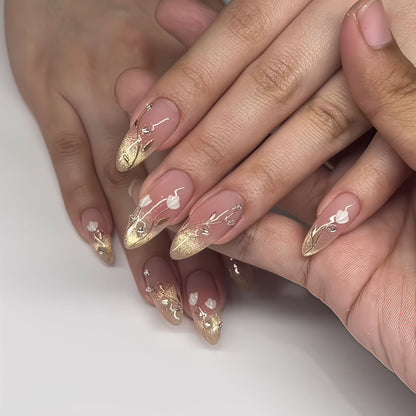 Elegante Stiletto Press-On Nagelkunstset mit Blumenakzenten Brehn