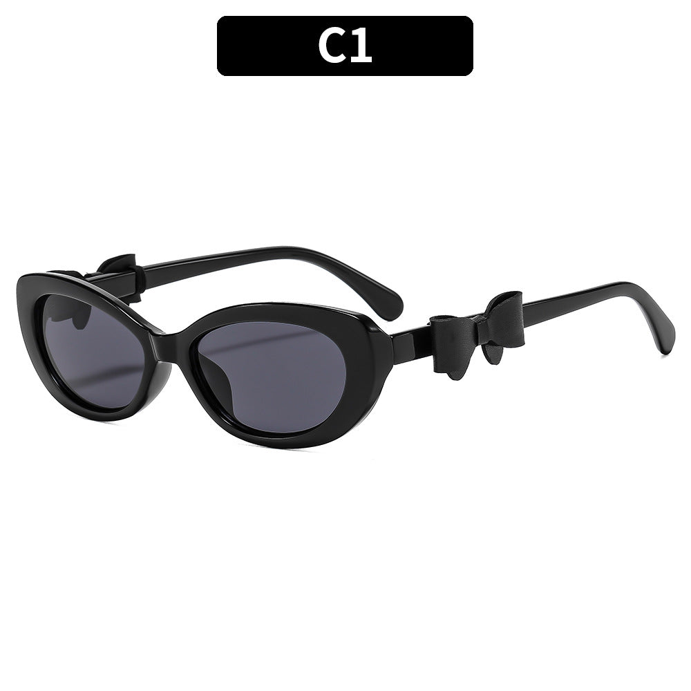 Vintage-inspirierte Katzenaugen-Sonnenbrille mit dekorativem Bogen