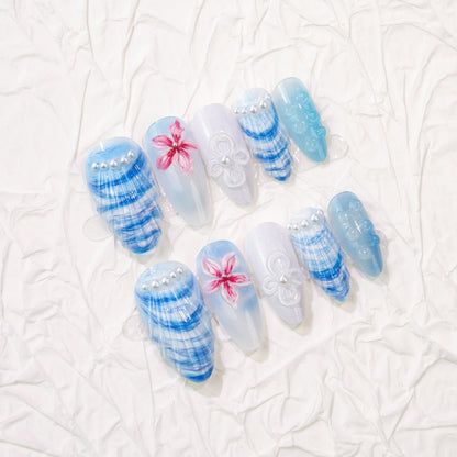 Künstlerisches floral und Muschel-Design Press-On Nagelkunst Set Brehn