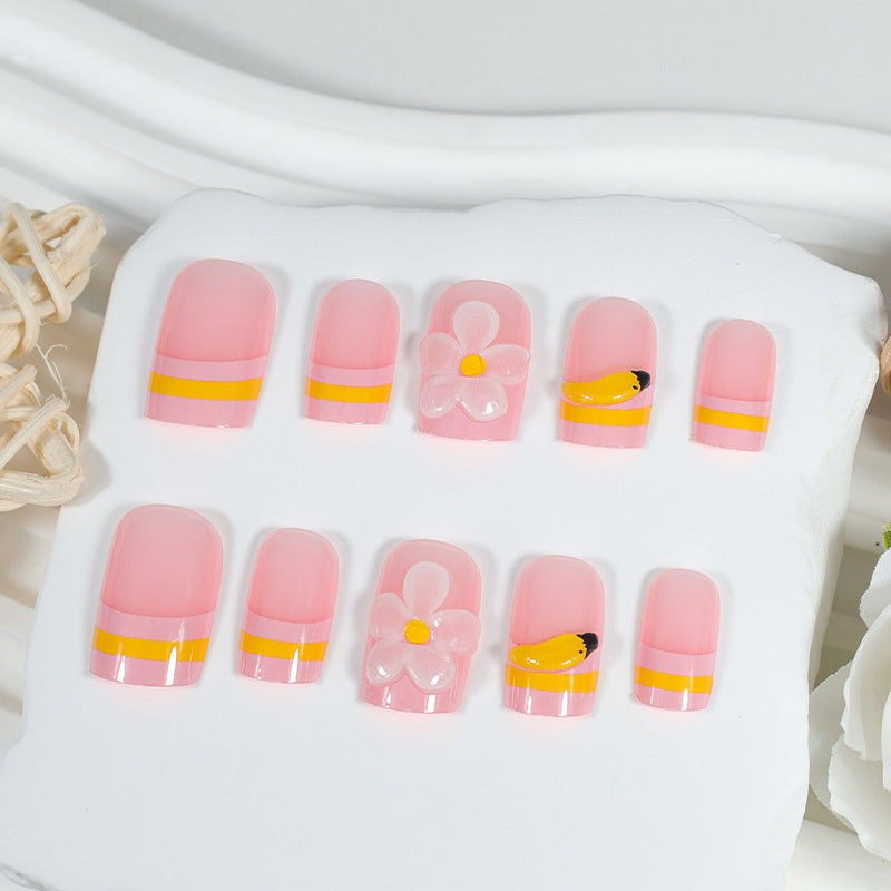 Kunstnagelset mit verspielten Blumen- und Fruchtmotiven Brehn