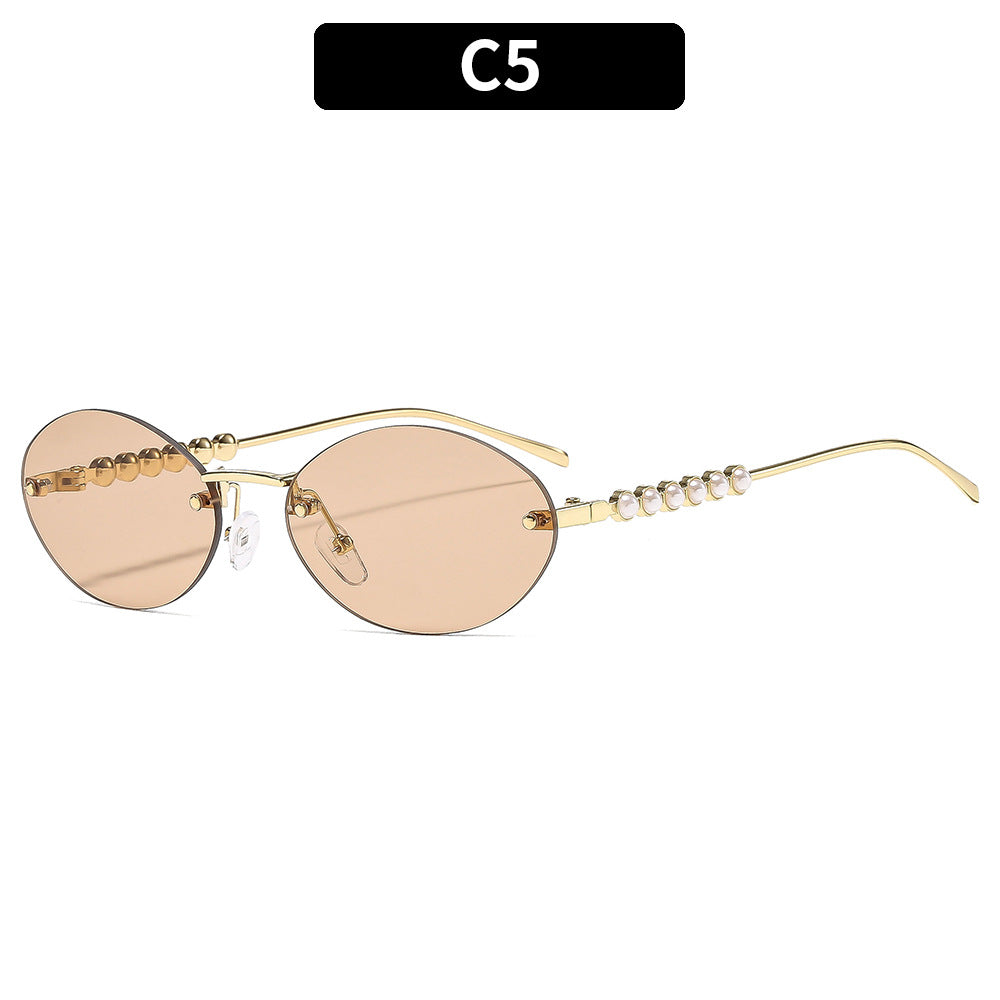 Elegante ovale Rahmen-Sonnenbrille mit dekorativen Perlenakzenten