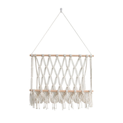 Elegante Makramee-Wanddekoration mit dekorativen Quasten und Holzrahmen