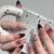 Kunstnagelset mit eleganten Schleifen- und Glitzer-Details Brehn