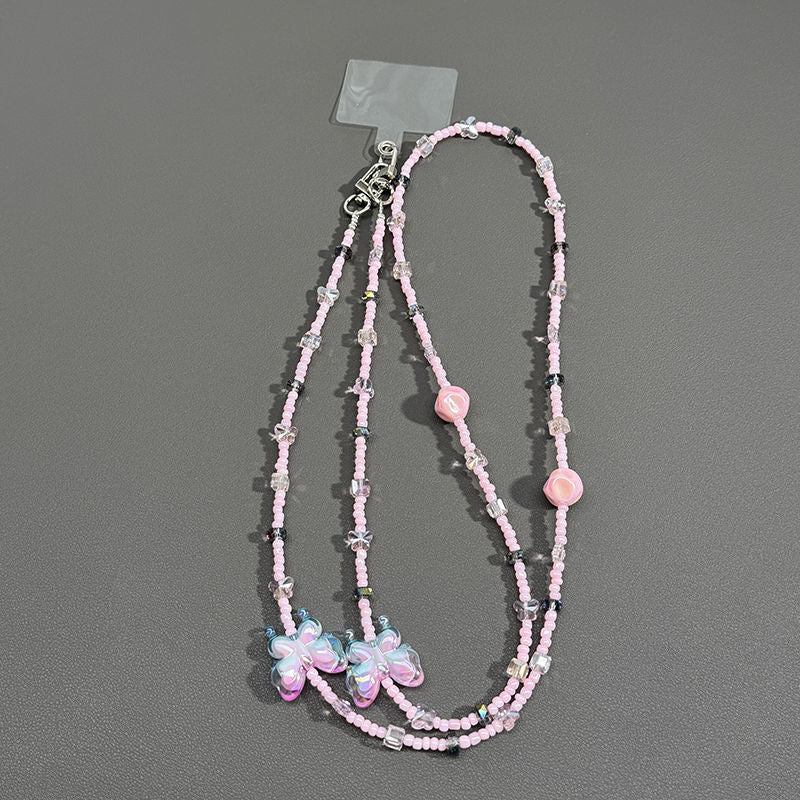 Perlenbrille Kette mit Schmetterlingsakzenten Brehn