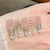 Dekorativer Strass Blumen Press-On Nail Set Brehn