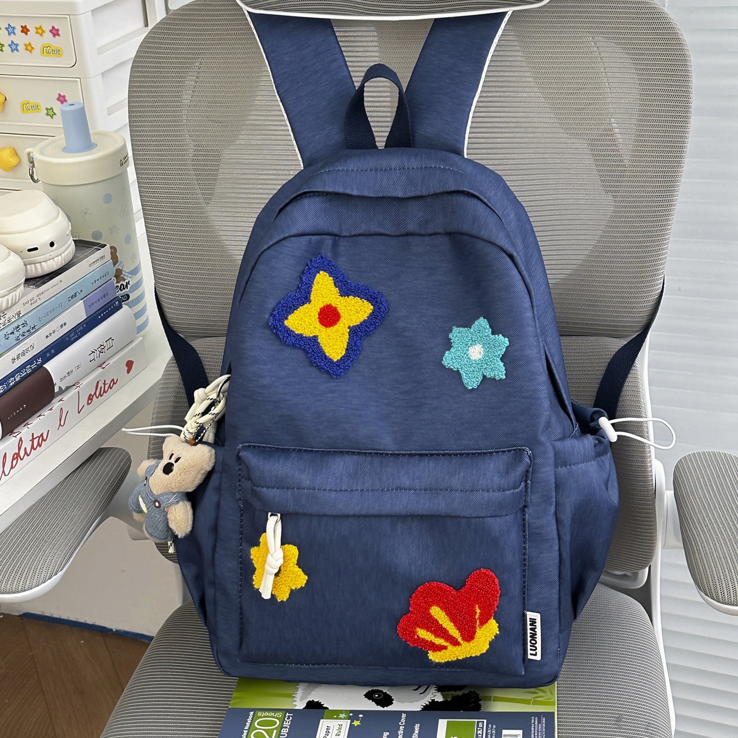 Blumenbestickter Schulrucksack