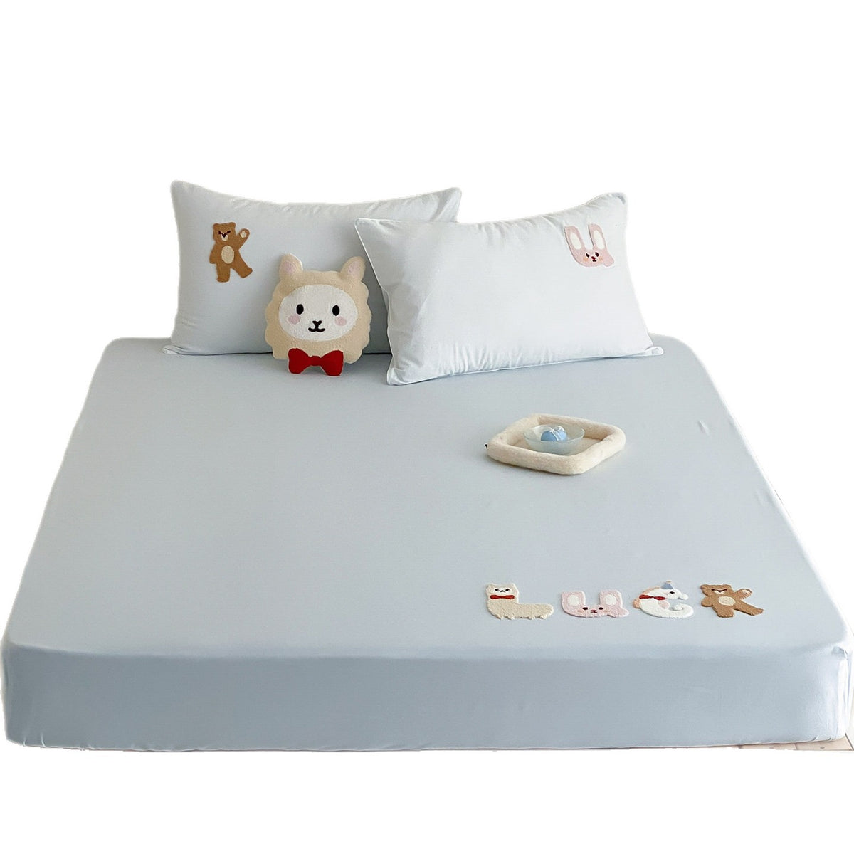 Besticktes Stretch-Spannbettlaken-Set mit Applikationsente und passenden Kissen