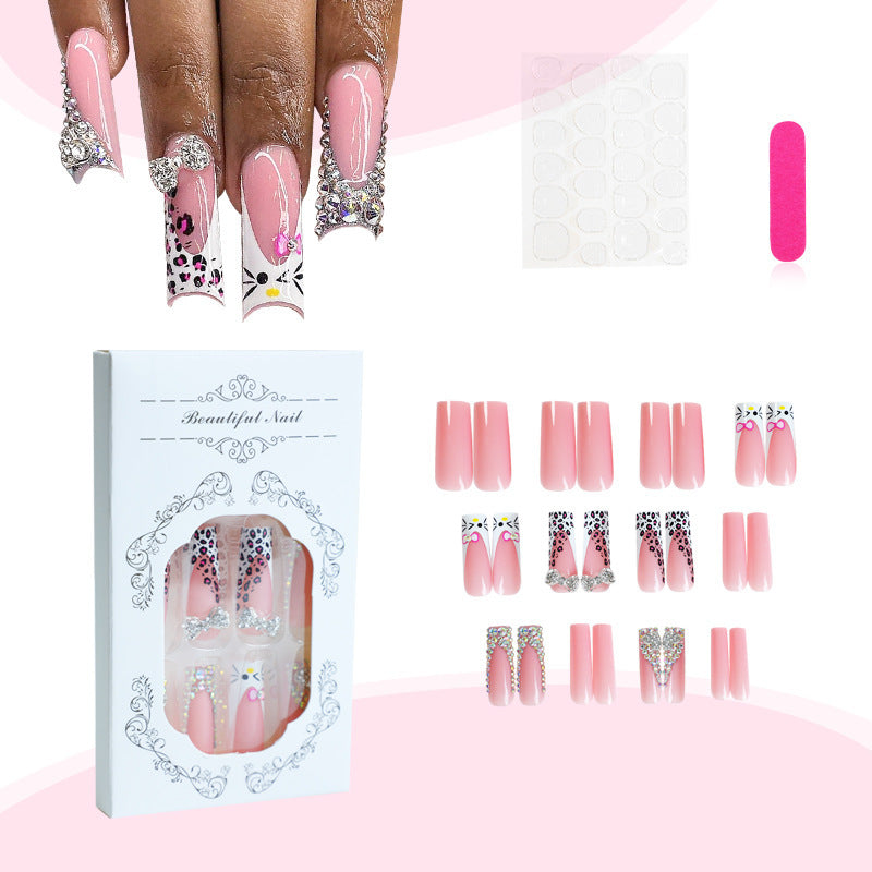 Glamouröses Kunstnagelset mit funkelnden Strassverzierungen und kreativen Tiermotiven Brehn