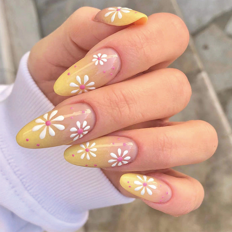 Kunstvolle Press-On Nägel mit floralen Mustern Brehn