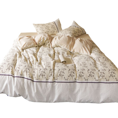 Baumwoll-Bettwäsche-Garnitur mit Waffelstruktur, feinem Blumenprint und Zierband