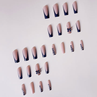 Kunstnagelset mit eleganten Spitzen und glamourösen Akzenten Brehn