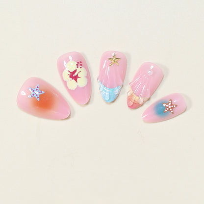 Künstlerische vom Ozean inspirierte Press-On Nagelkunst Brehn