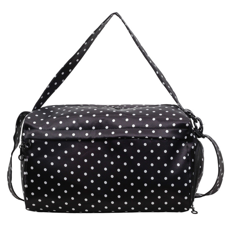 Stylische gepunktete Reisetasche