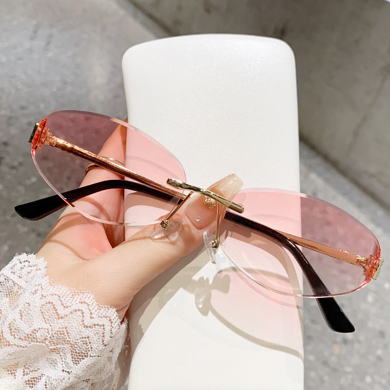 Damen Sonnenbrille im modernen Ovaldesign mit kontrastierendem Rahmen Brehn