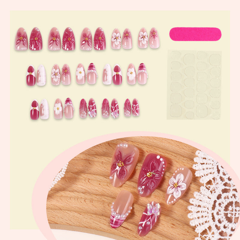 Kunstnagelset mit floralen Designs und 3D-Verzierungen Brehn