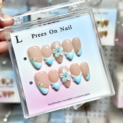 Künstlerisches Press-On-Nagel-Set mit floralen und grünen Akzenten