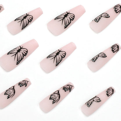 Kunstvolle Nagelverlängerungen mit Schmetterlingsdesign Brehn